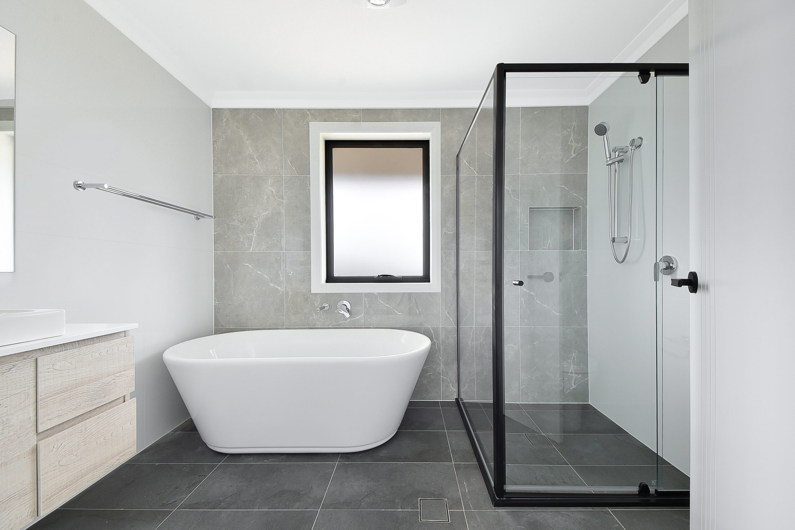 Contemporary bathroom in this Investment Build in Sydney
